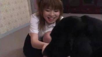 Japanese beauty in white fucks a dog, gets thoroughly creampied
