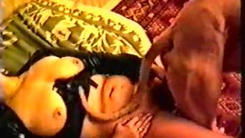 Busty mature mom in rubber gear attempts rear-entry with her personal animal