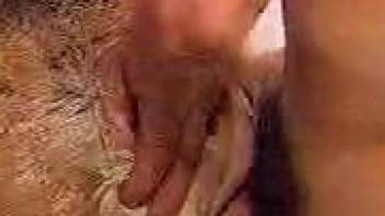 Close-up scene of a zoophile fucking hairy animal's ass