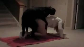 Dominatrix regularly has sex with her own dog