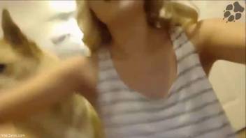 Young blonde teen has her vagina eagerly tongued by a canine