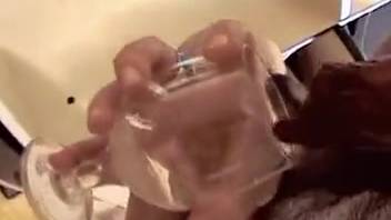 Horny vixen guzzles canine jizz after webcam pounding