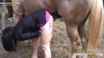 Masked babe handles a stud's rigid cock