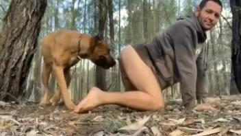 Adorable homosexual submissive being penetrated by a canine in the forest