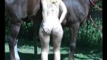 Colorful chick enjoying hardcore anal with a horse