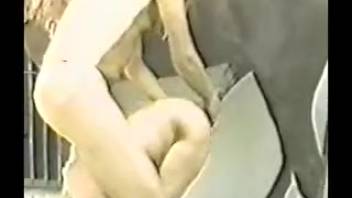 Blonde woman captured on camera in steamy bestiality scenes